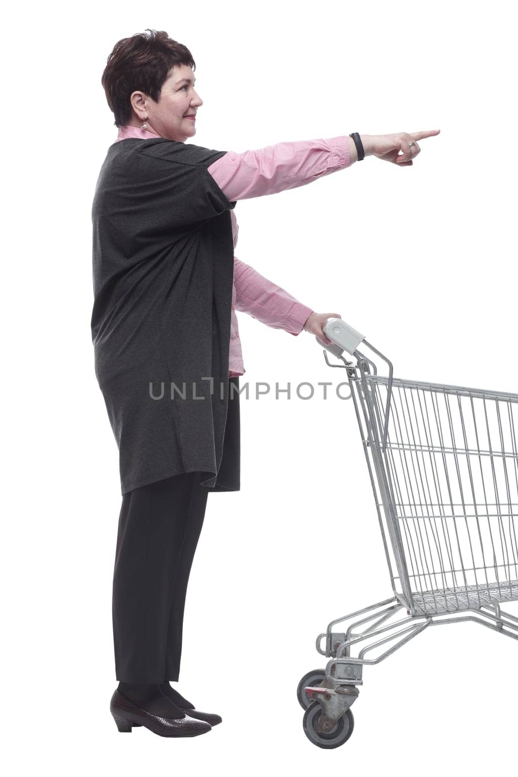 side view. a female customer with an empty shopping cart . isolated on a white background