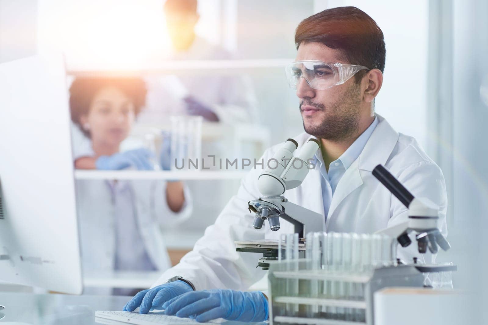 Focused male scientist working in laboratory