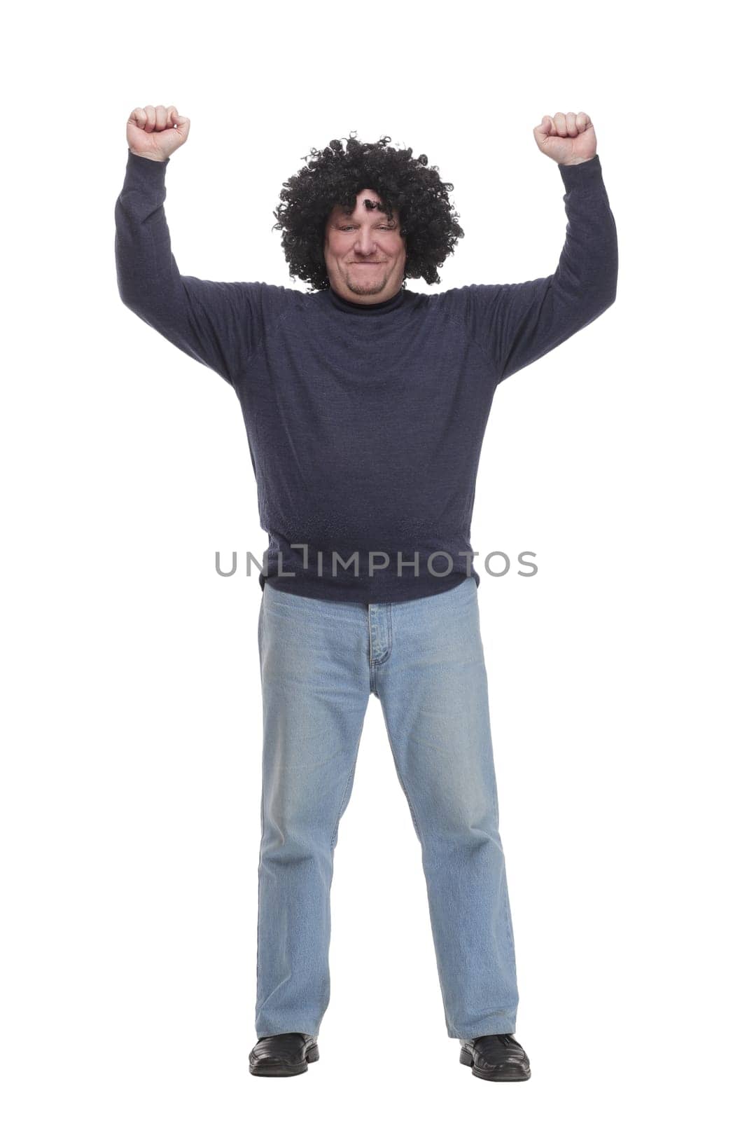 full-length. cheerful mature man in a wig. isolated on a white background.