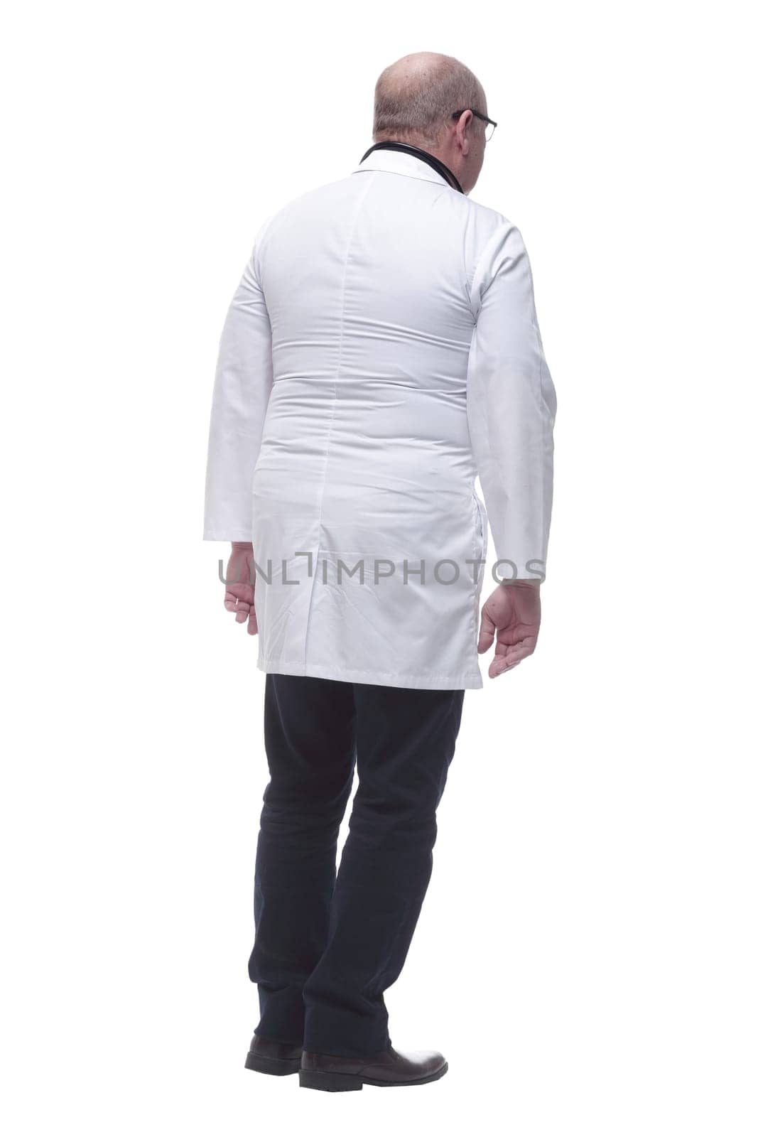 rear view. doctor-therapist reading an ad on a white screen. isolated on a white background