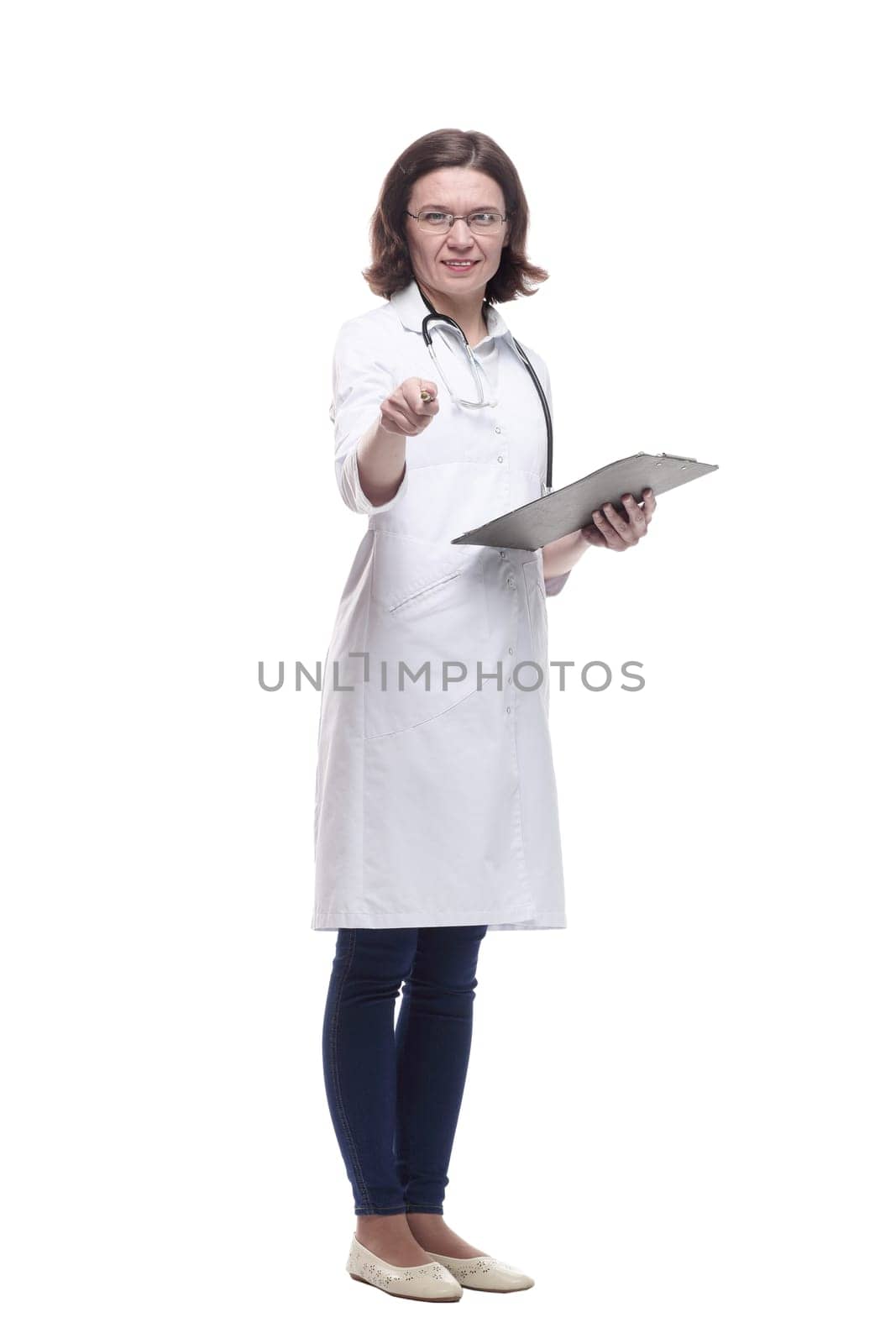 Mature female doctor with clipboard. isolated on a white background.