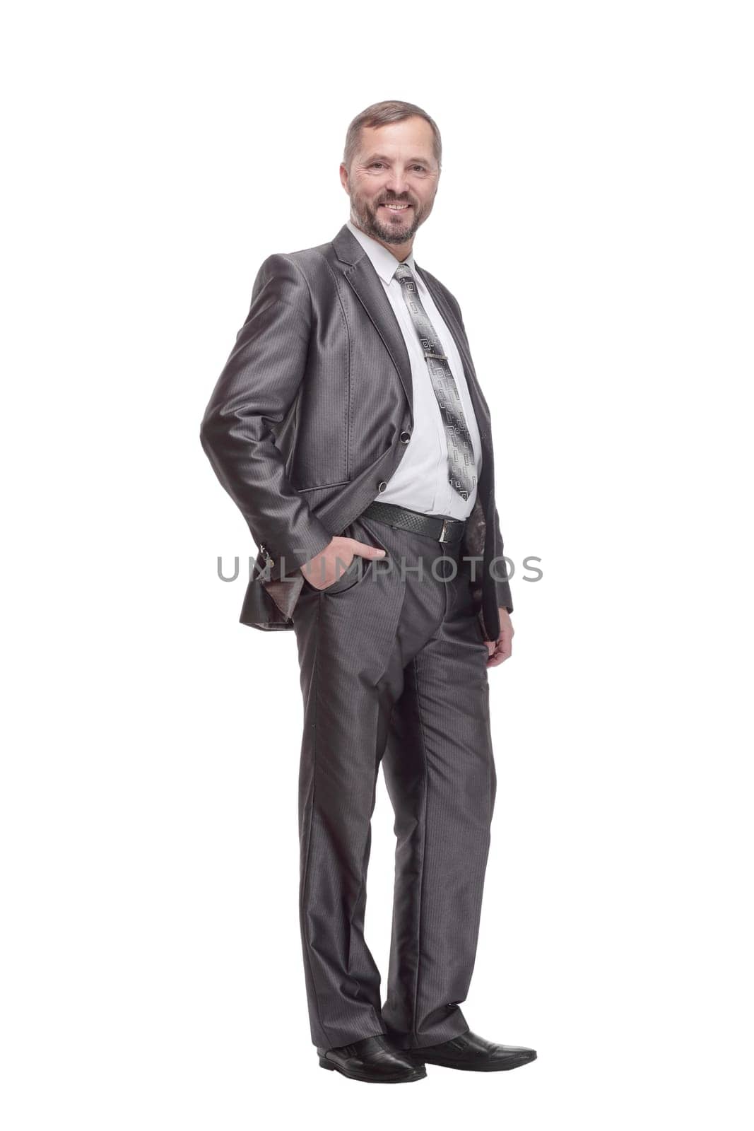 in full growth. handsome business man. isolated on a white background.