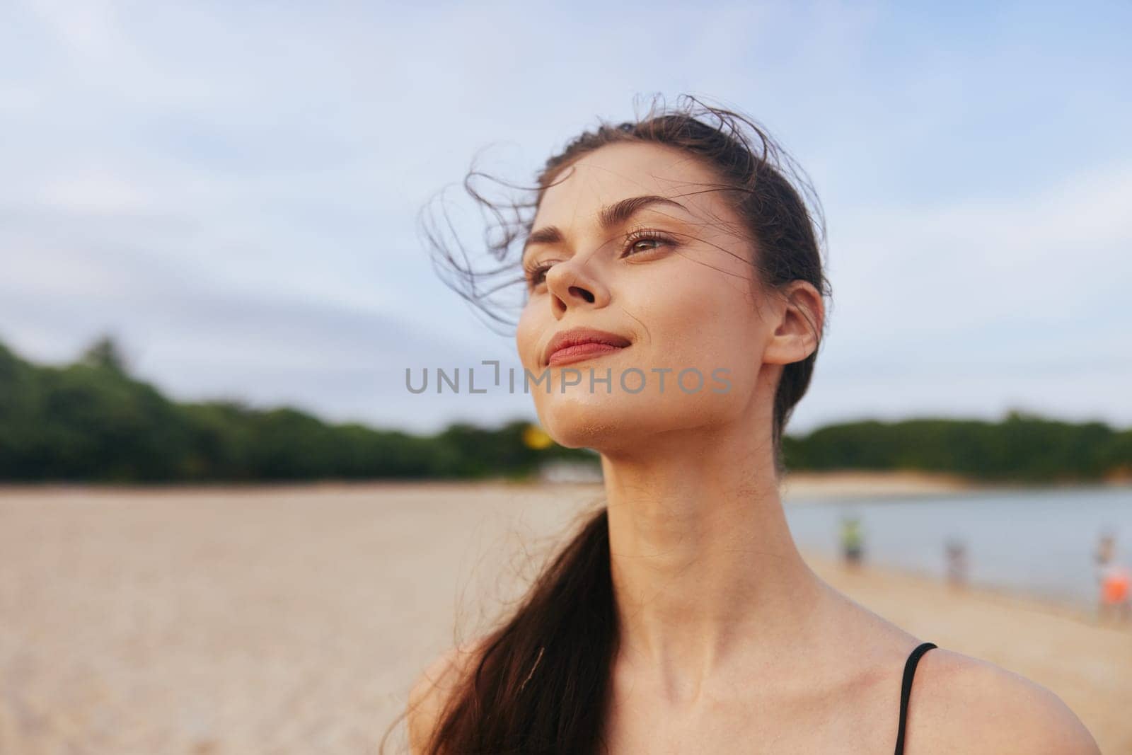 woman outdoor holiday sunset ocean sand enjoyment long summer vacation smile hair female sea lifestyle freedom beach nature free happy person water