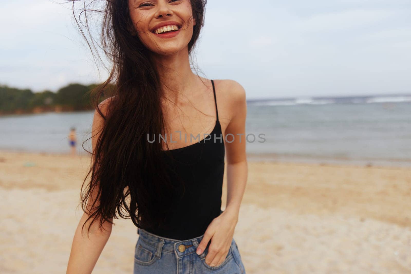 female woman shore sand vacation beautiful nature lifestyle running girl smile ocean sea hair beach coast smiling long sunset summer young travel
