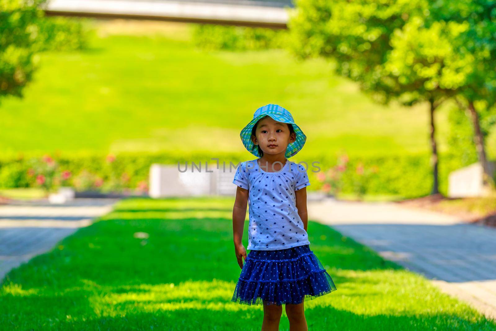 Little girl having a good time in the garden