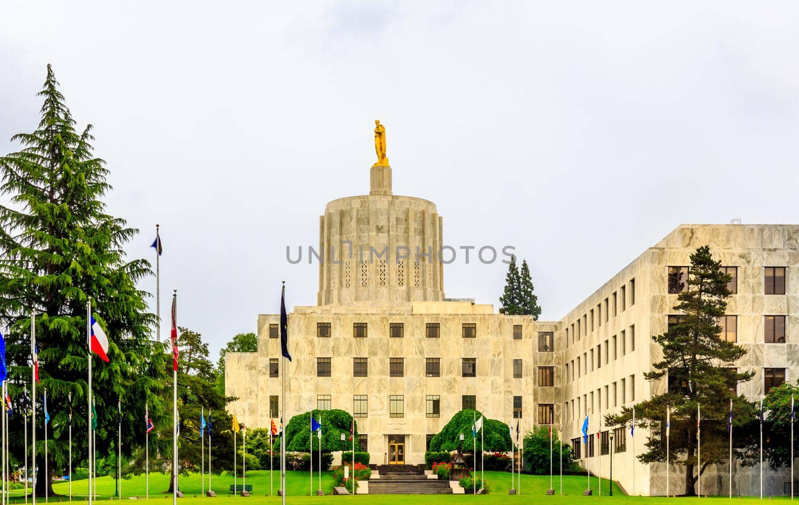 Salem, Oregon, United States - May 22, 2013: The Oregon Capitol Building shows the pioneer statue atop the capitol.