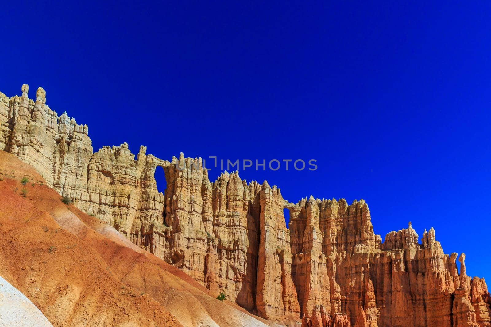 Windows in a cliffwall of hoodoos at the 'Wall of Windows' in Bryce Canyon National Park, Utah.