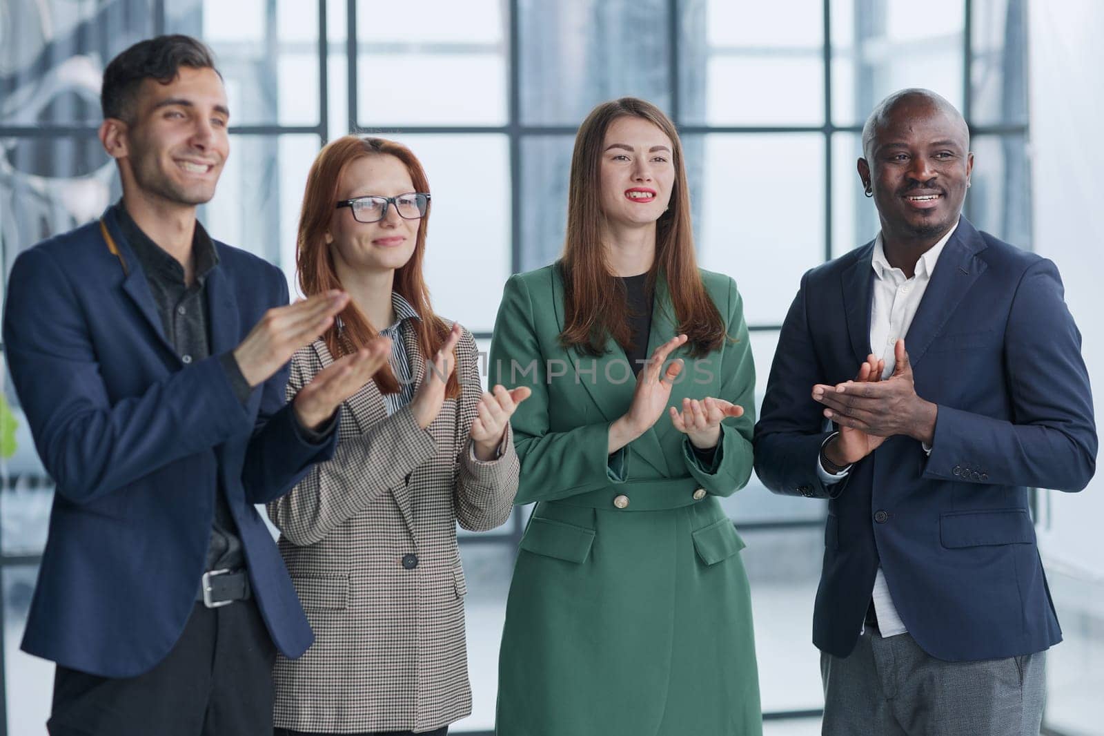 Now thats a standing ovation. Shot of a group of businesspeople applauding during a seminar in the conference room.