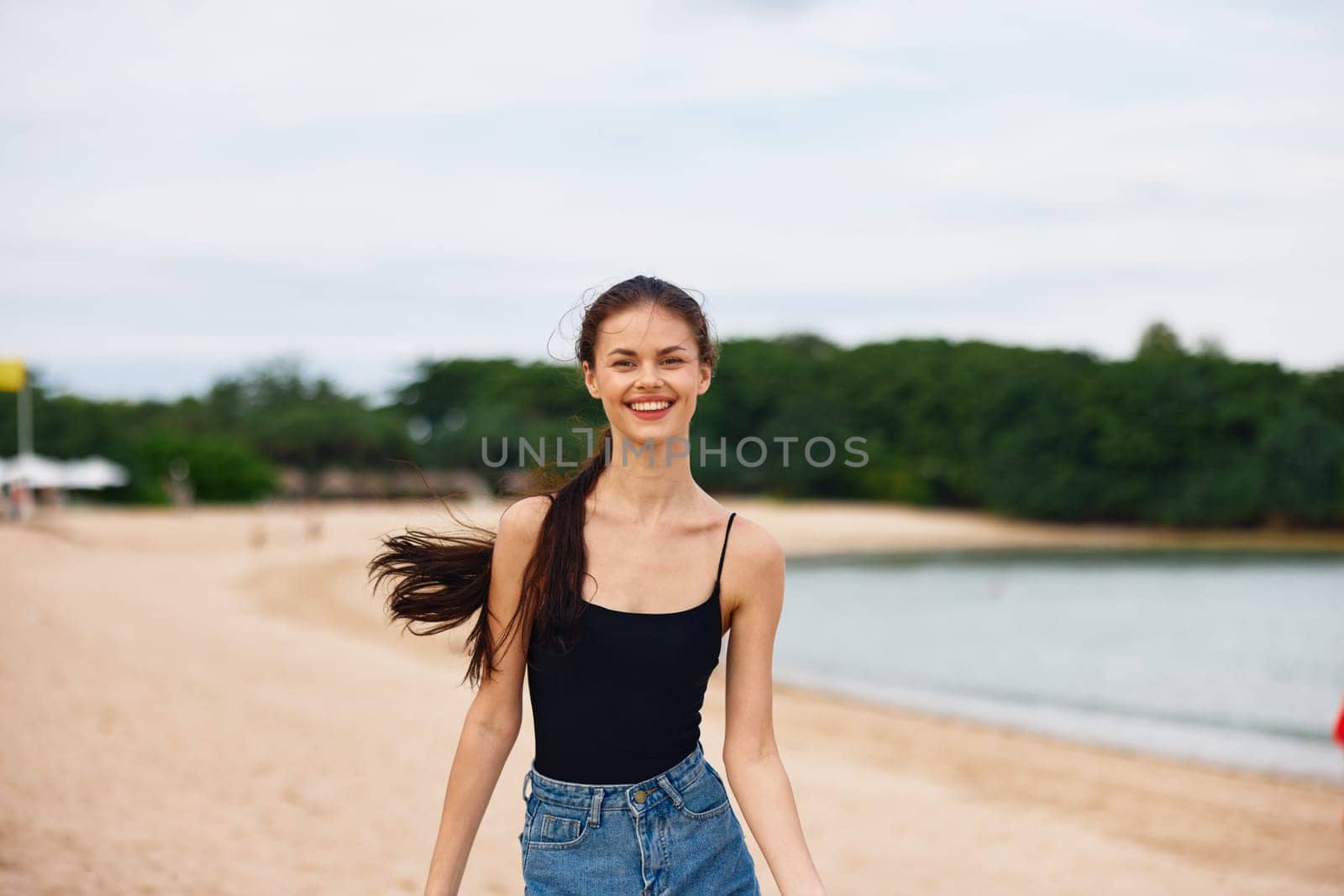 lifestyle woman sunset nature tan sunrise beauty travel young shore smiling running smile summer sea leisure female beautiful positive happiness beach