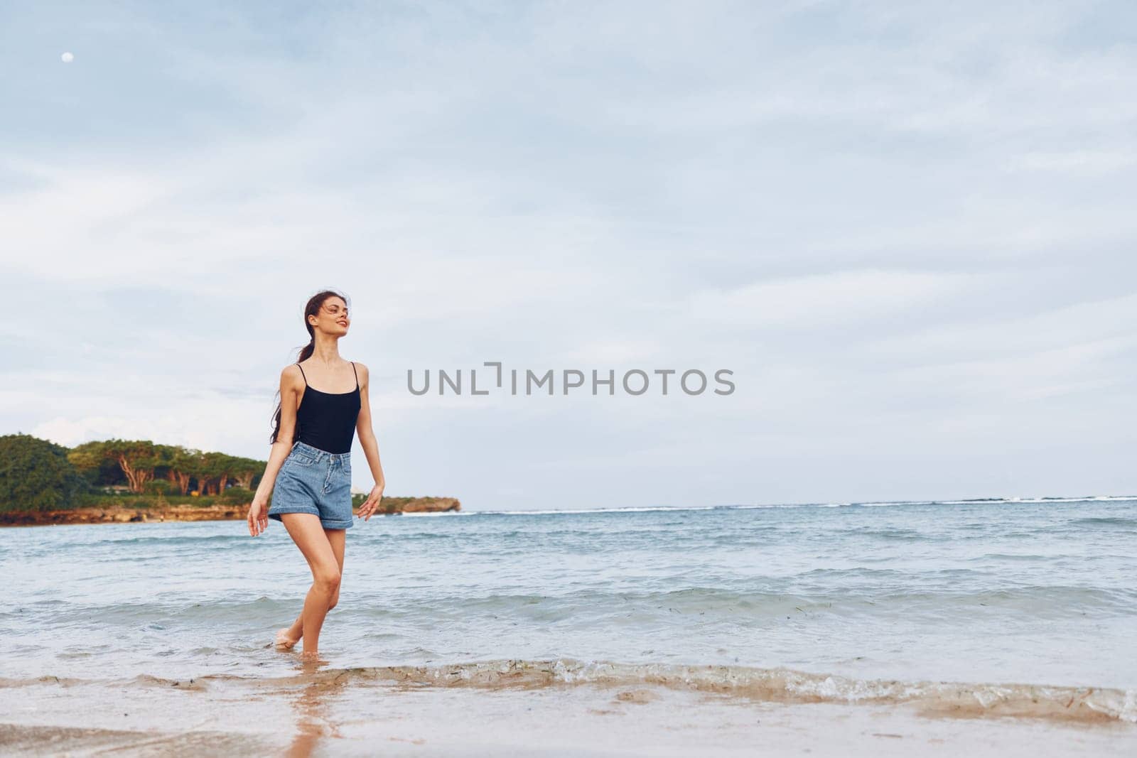 woman lifestyle young running happiness smile beach sunset travel summer sea by SHOTPRIME