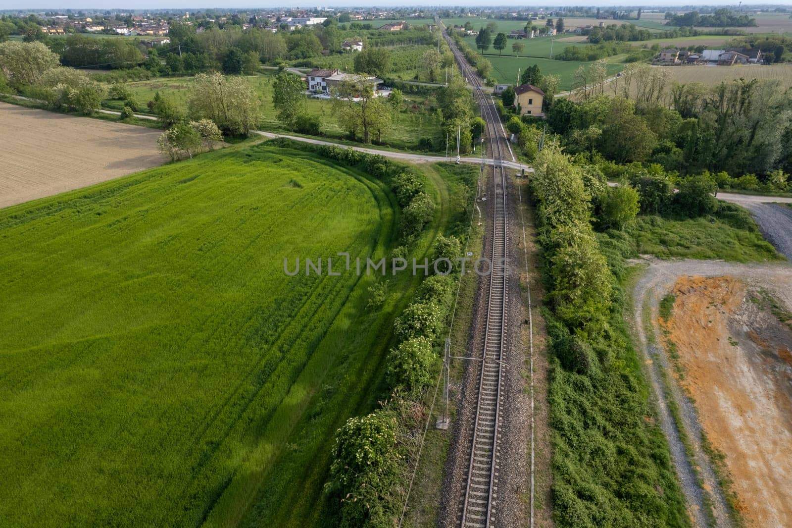 Flying over railway tracks, top view. Railway track tracks line railroad train rail aerial photo panoramic view travel