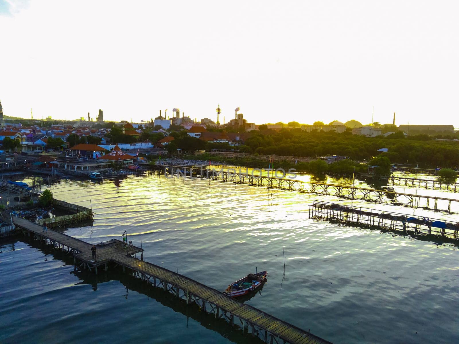 Aerial top down on traditional colourful asian fisherman boats moored in Gresik, Indonesia. Drone Photography. Aerial Photography.