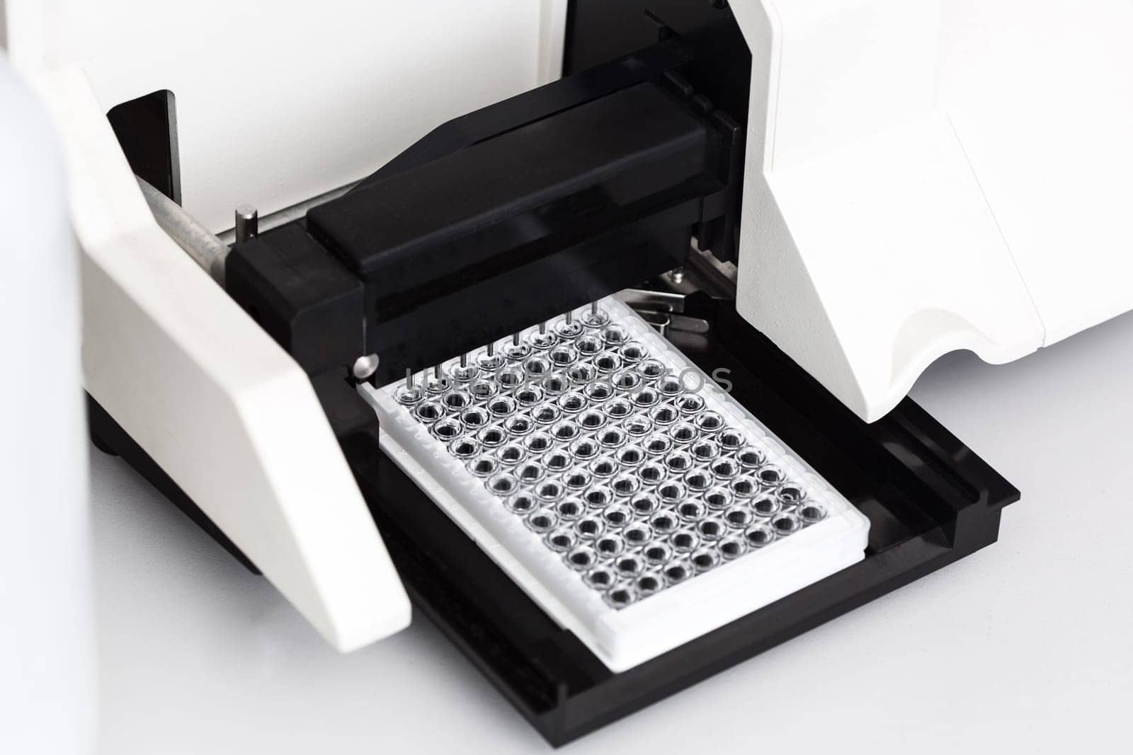 A chemical sample bottle. Centrifuge. A test tube vial sets for analysis. Medical research