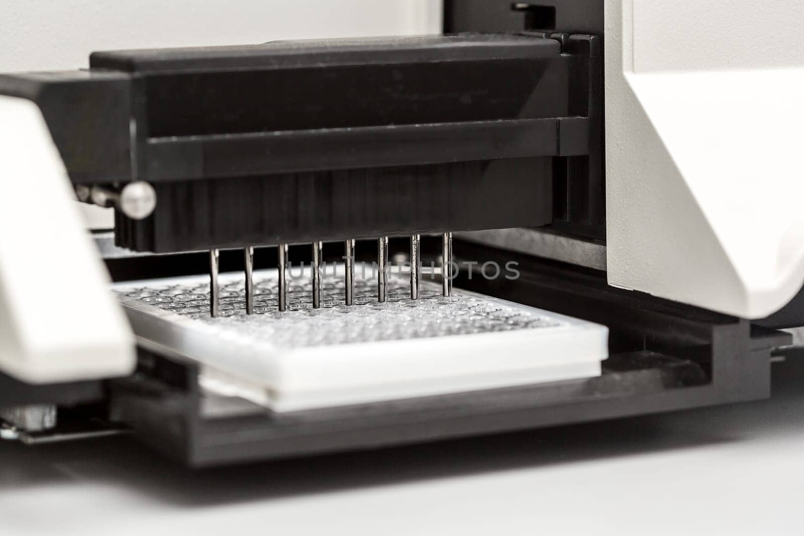 A chemical sample bottle. Centrifuge. A test tube vial sets for analysis. Medical research