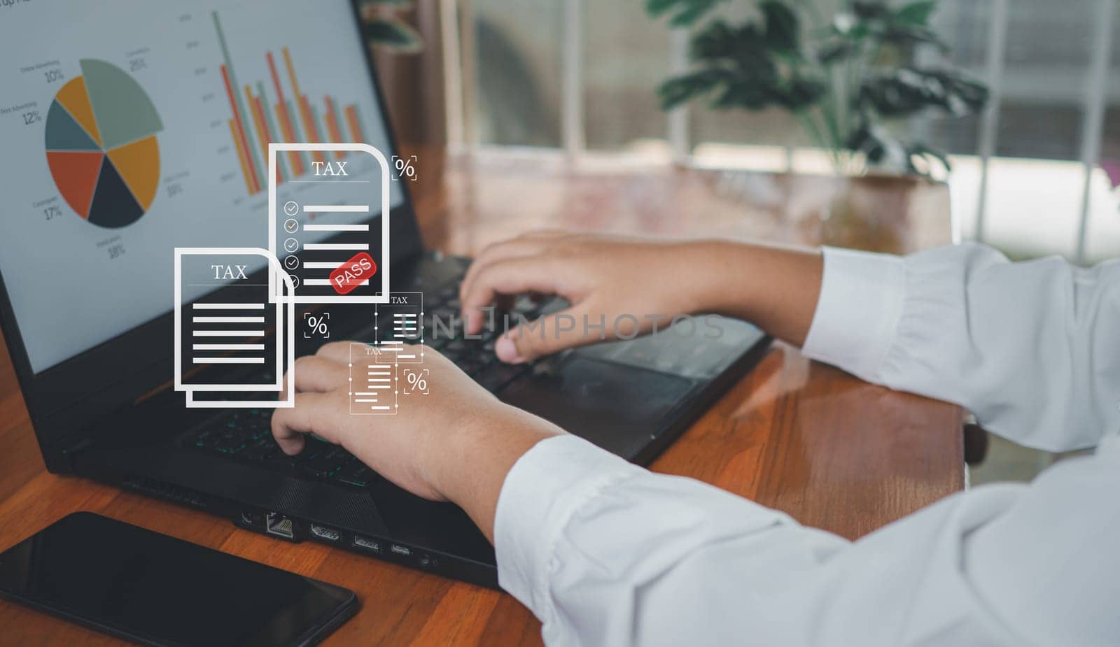 Business woman using a computer to complete Individual income tax return form online for tax payment. financial research, report. Calculation tax return.