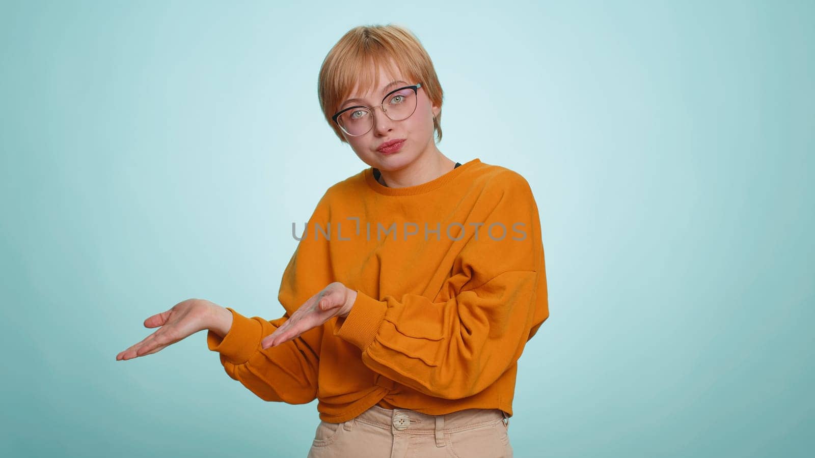 Woman raising hands asking what why reason of failure, demonstrating disbelief irritation by troubles trendy social media meme anti lifehacks ridicules people who complicate simple tasks for no reason