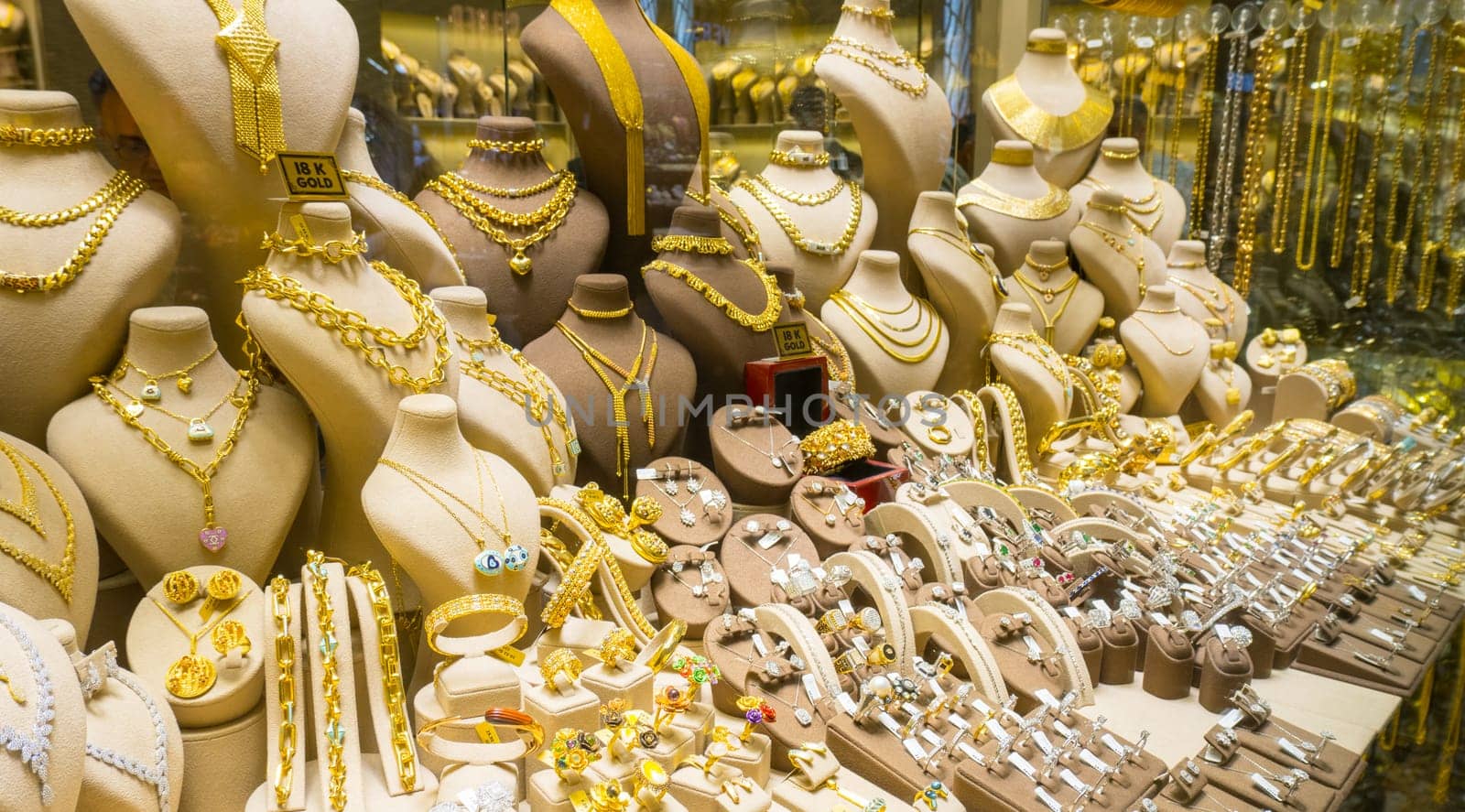 Istanbul, Turkey, May 02, 2023: A jewelry store showcase decorated with gold jewelry.