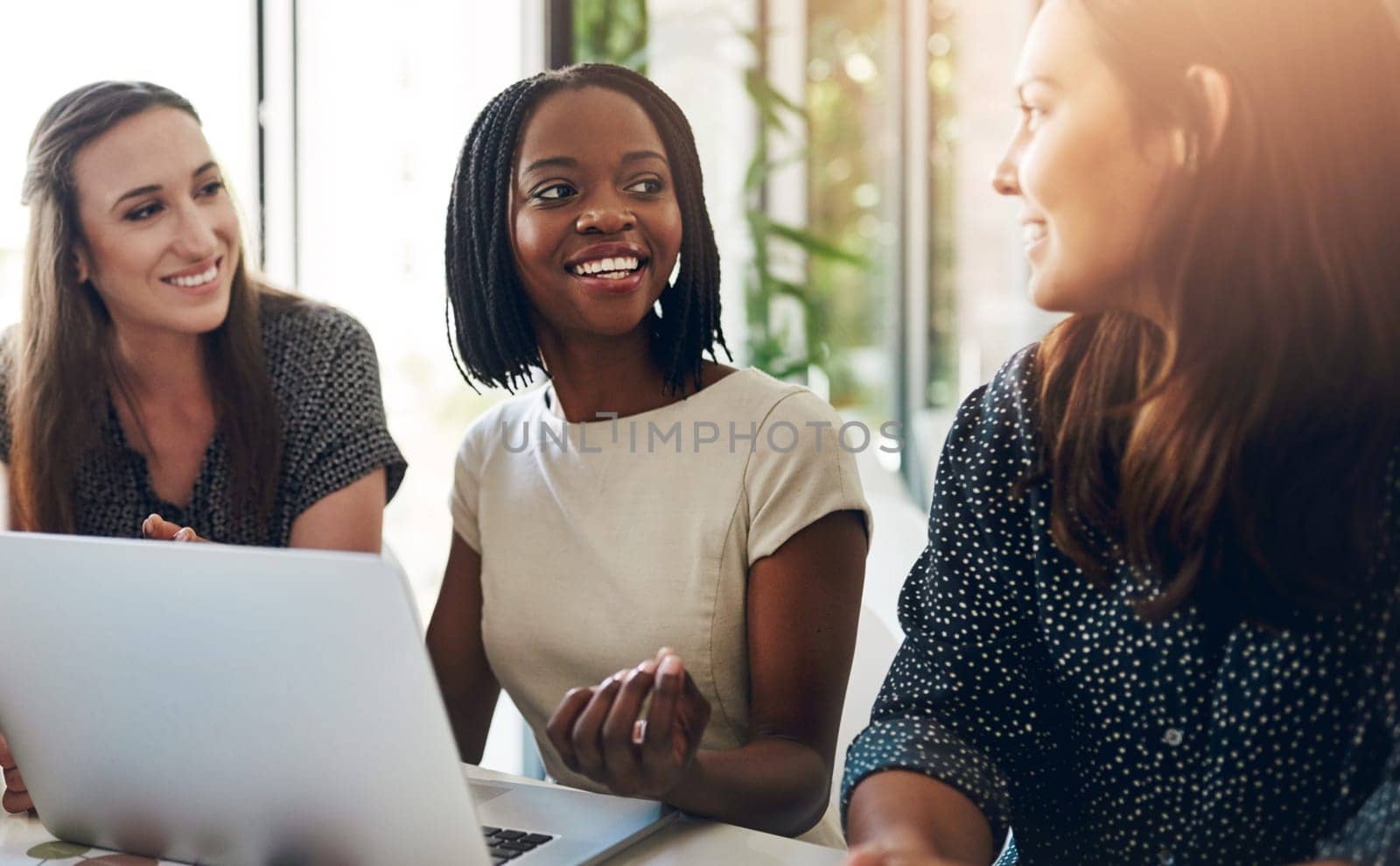Business women, conversation and laptop data with planning and strategy in office. Training, communication and online chart with corporate tech and working on a teamwork project with diversity.