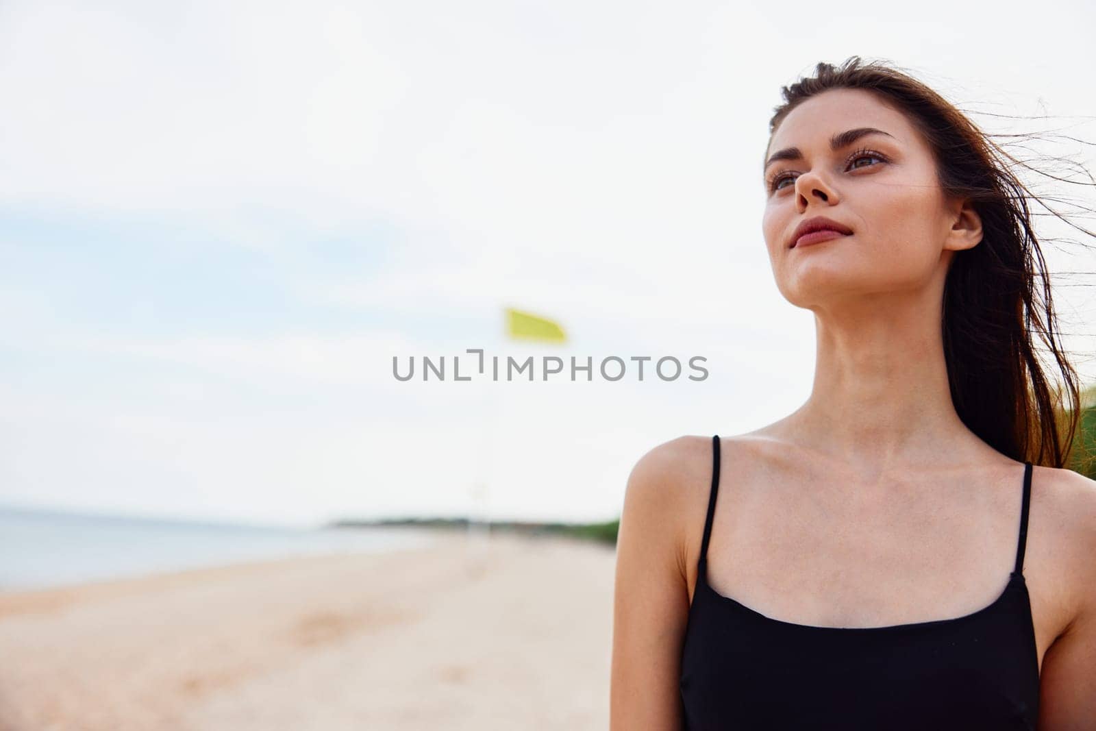 nature woman ocean summer person sea sun happy vacation shore sand holiday bag enjoyment travel leisure copy-space beach smile adult young