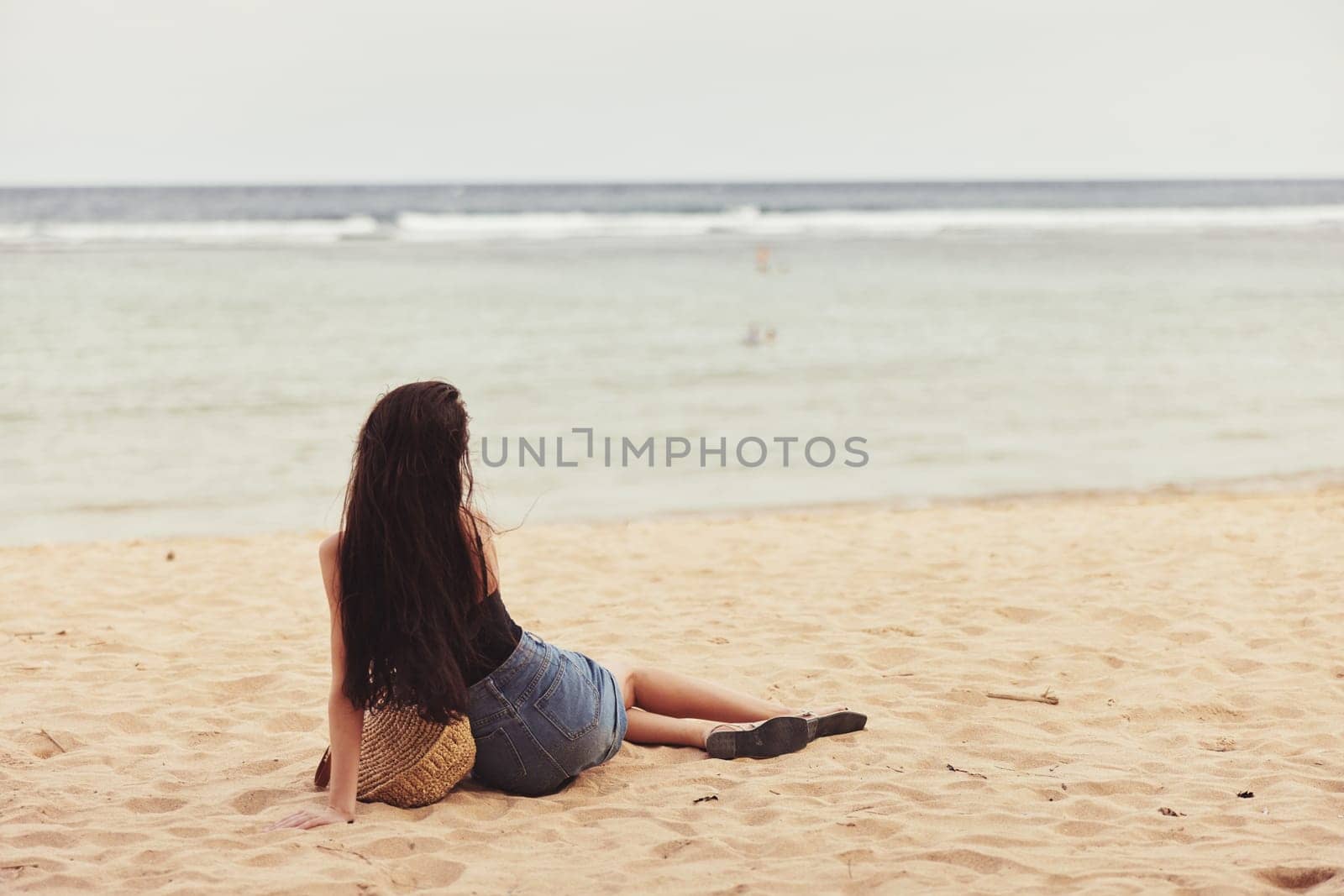 travel woman bali hair alone water vacation beach tropical female sand smile sea happy sitting fashion nature person freedom lifestyle attractive