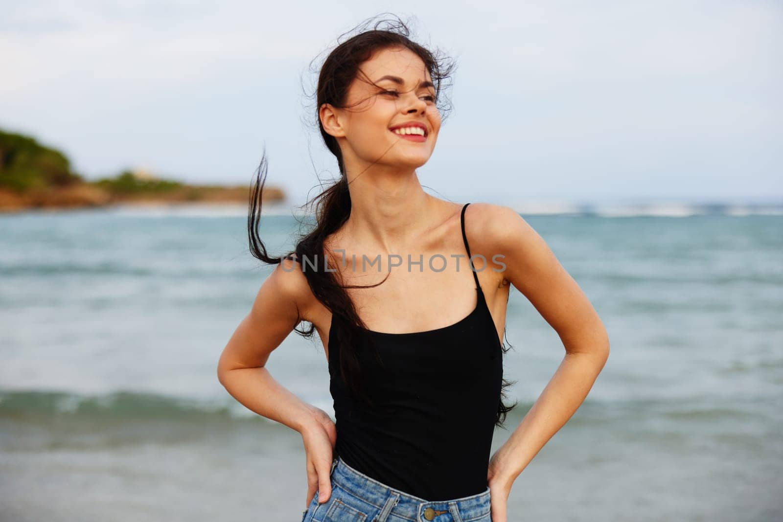 woman sea sun carefree copy-space freedom happiness person summer smile happy vacation coast peaceful lifestyle ocean sand caucasian sunset beach tropical