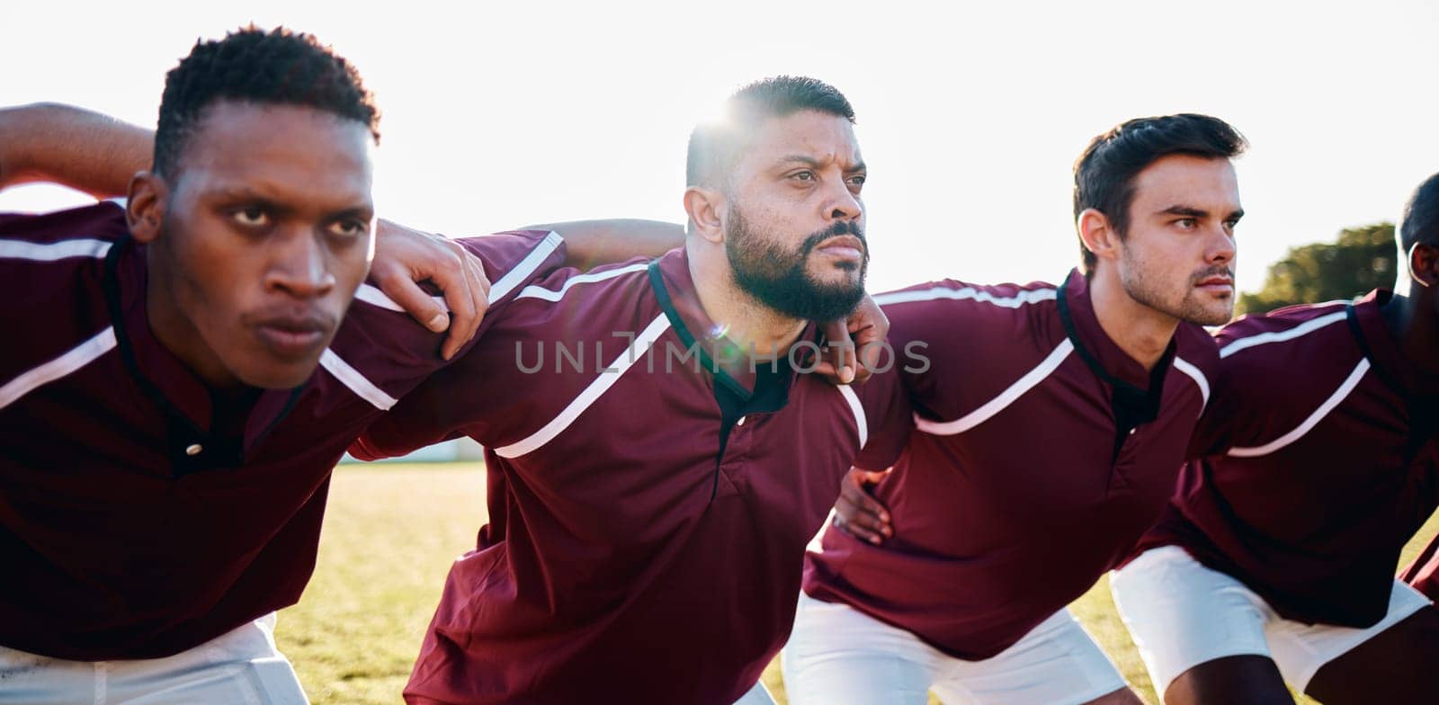 Man, huddle and team in scrum for sports collaboration coordination or focus in the outdoors. Group of sport men in fitness training, planning or getting ready for serious game, match or start.