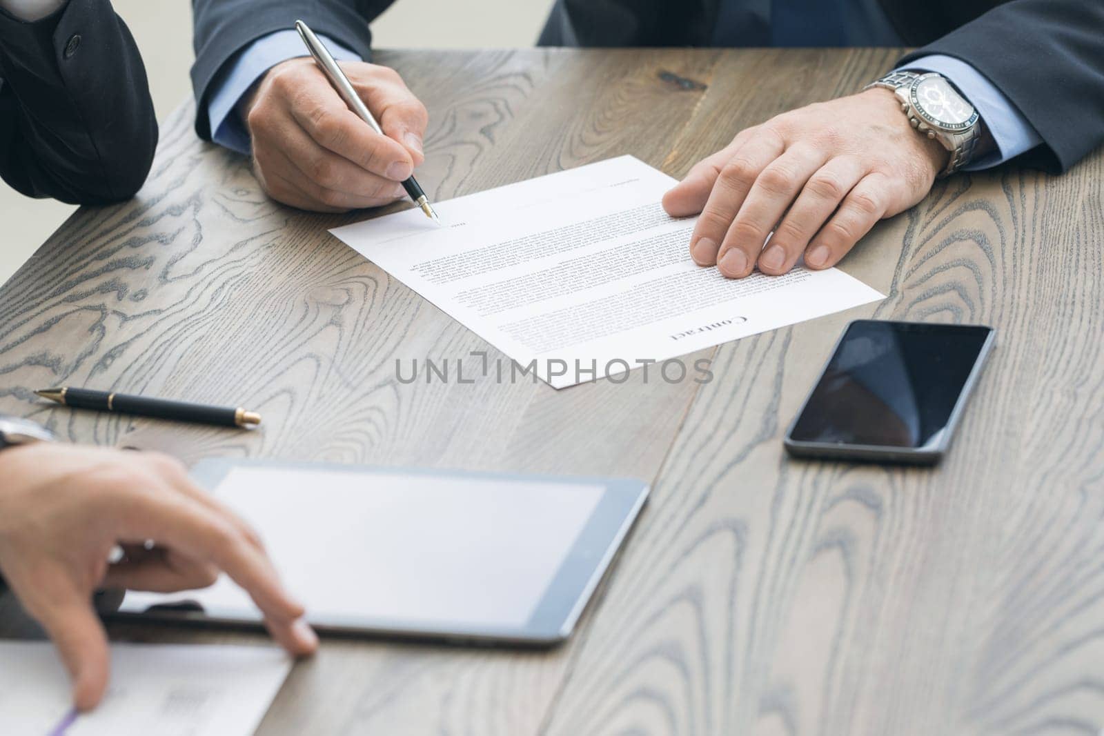 Business man sign contract on the desk at meeting