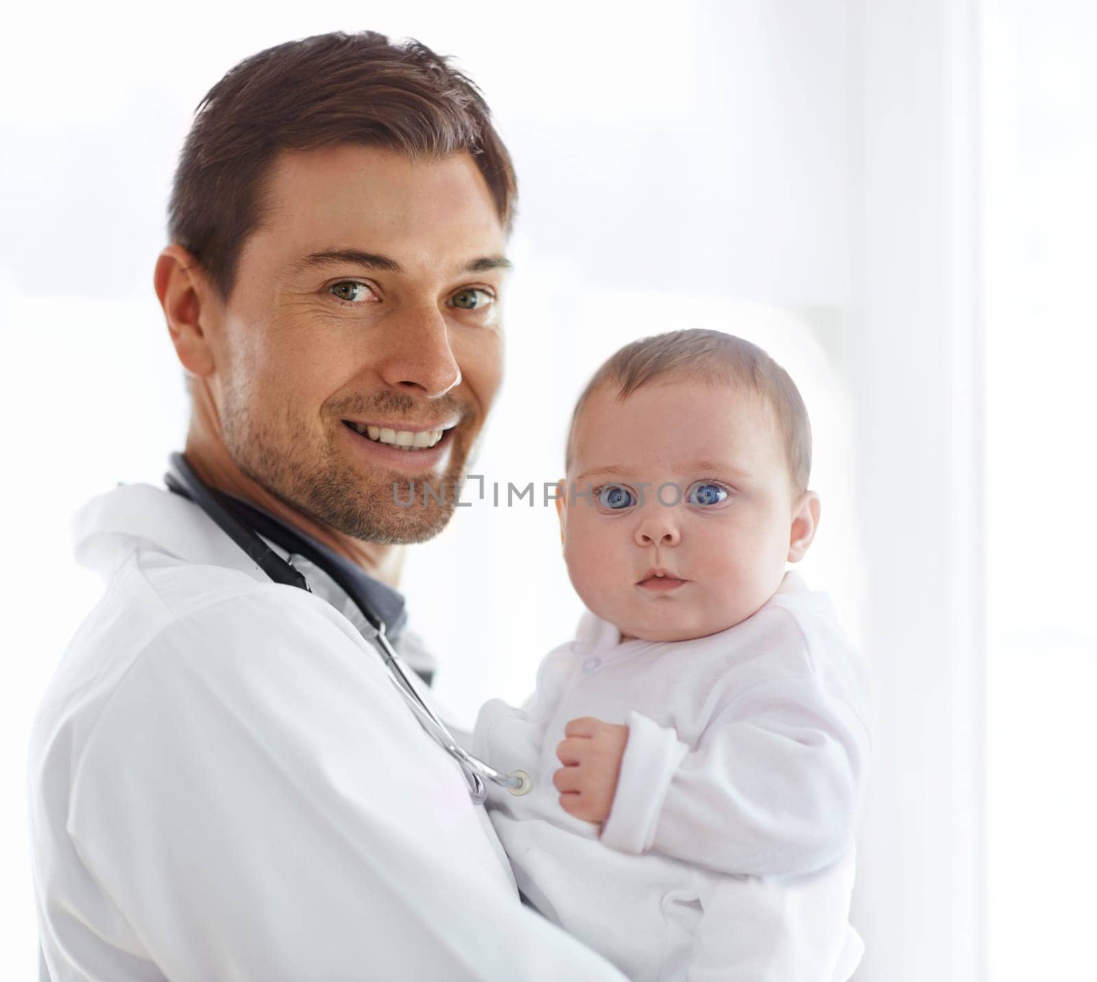 Portrait of happy man, pediatrician and baby for medical assessment, growth support and healthcare of children. Newborn kids, doctor and smile in clinic, hospital and consulting service in pediatrics by YuriArcurs