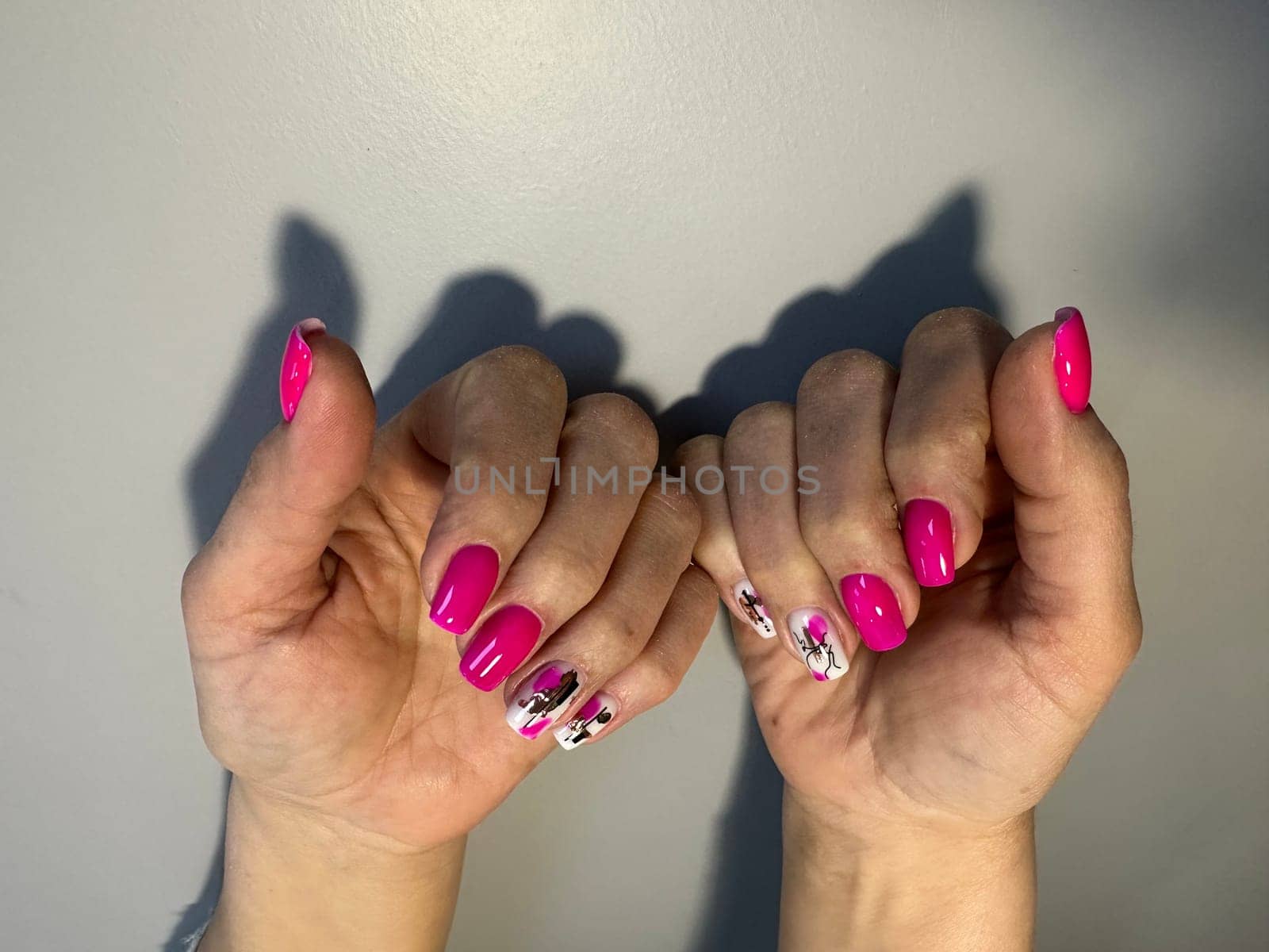fashion manicure of nails on a beautiful background by SmirMaxStock