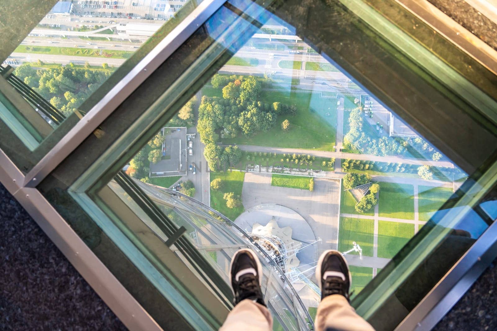 Feet on glass floor at the Ostankino tower in Moscow, Russia