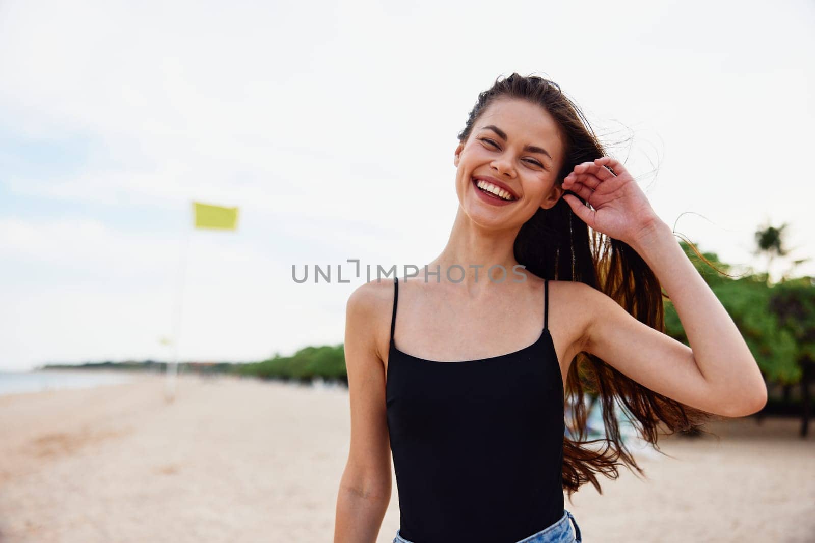 woman vacation beach sand smile nature young summer sea happy ocean by SHOTPRIME