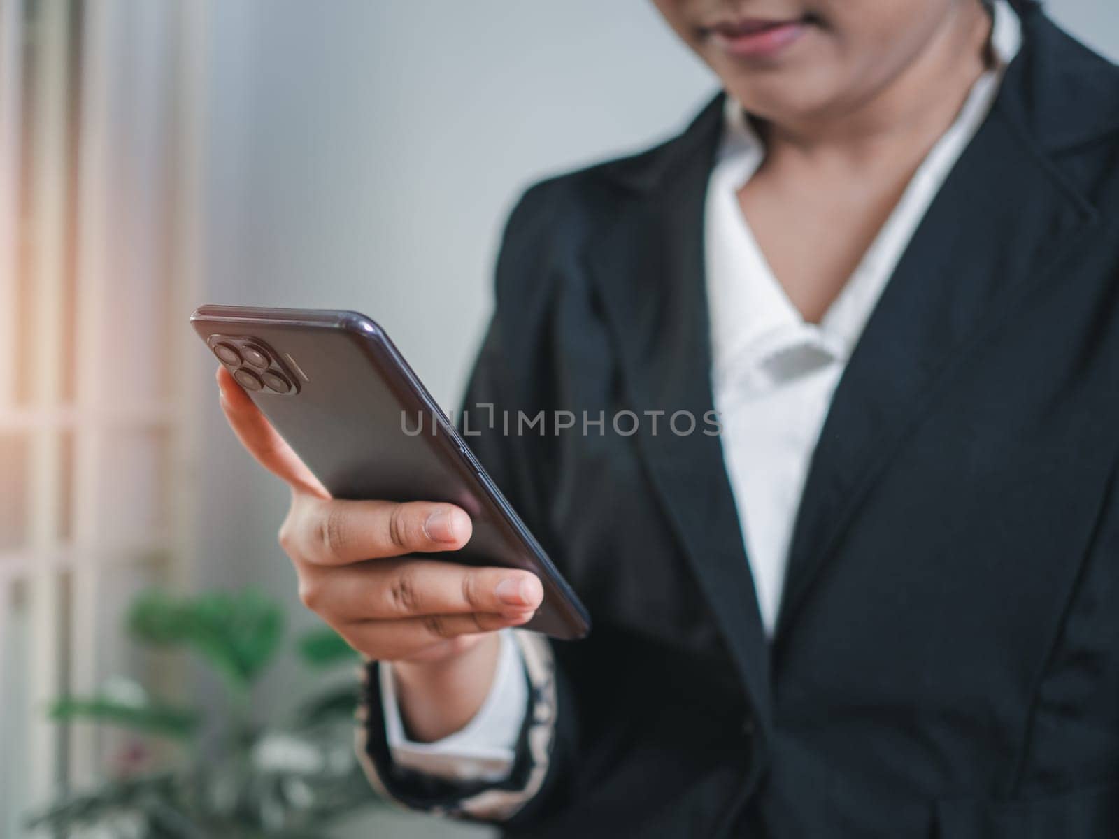 Business woman hand using smartphone typing live chat chatting on application communication digital web and social network concept. Social media application chat box.