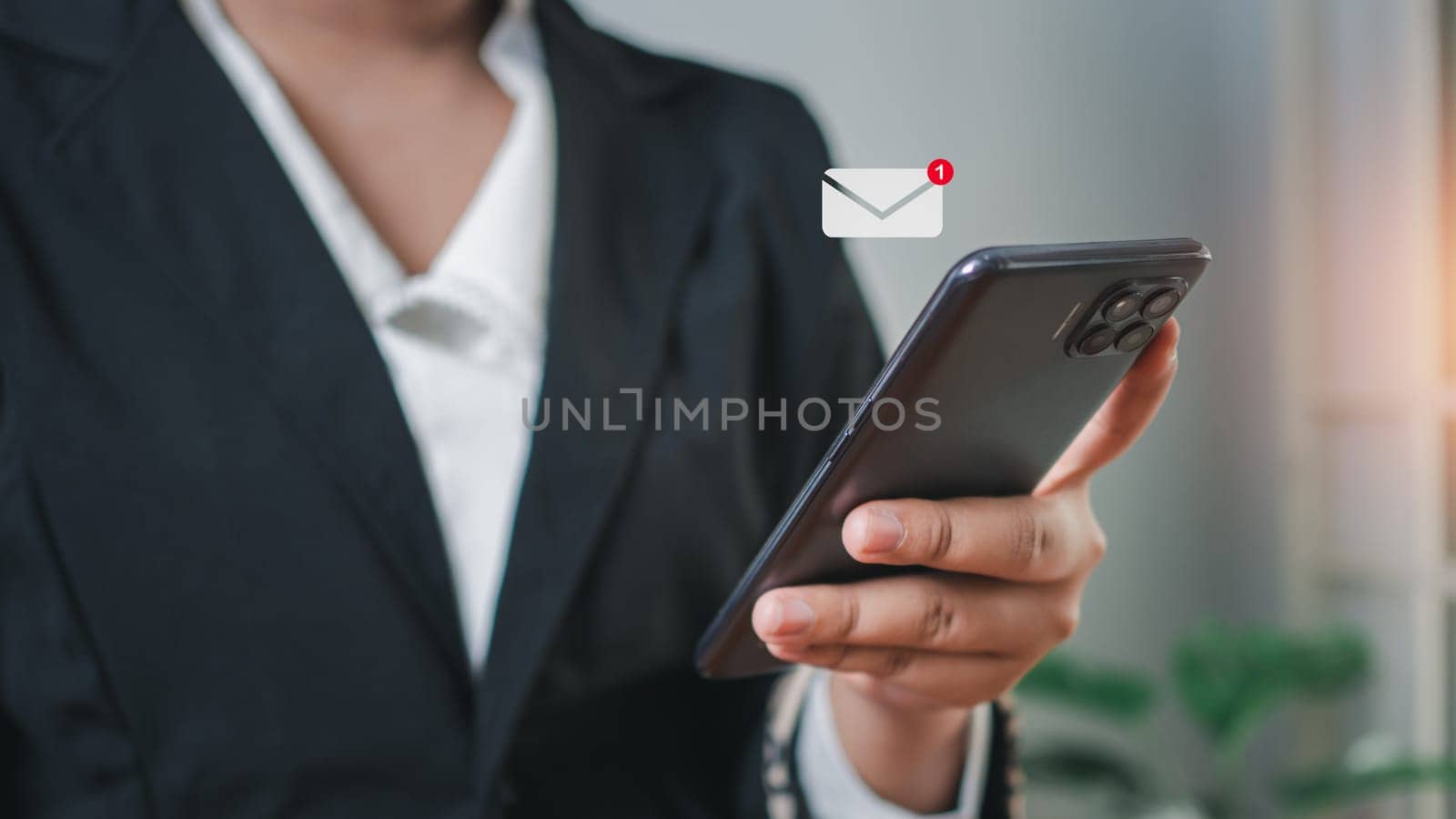 Business woman hand using smartphone  application communication . New email notification concept for business email communication and digital marketing. The inbox receives electronic message notifications. internet technology by Unimages2527