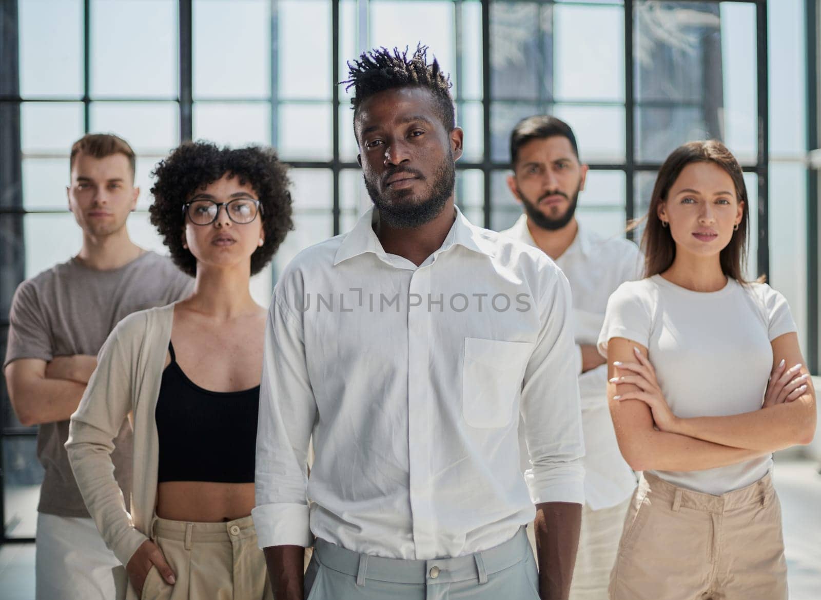 Face of beautiful woman on the background of business people
