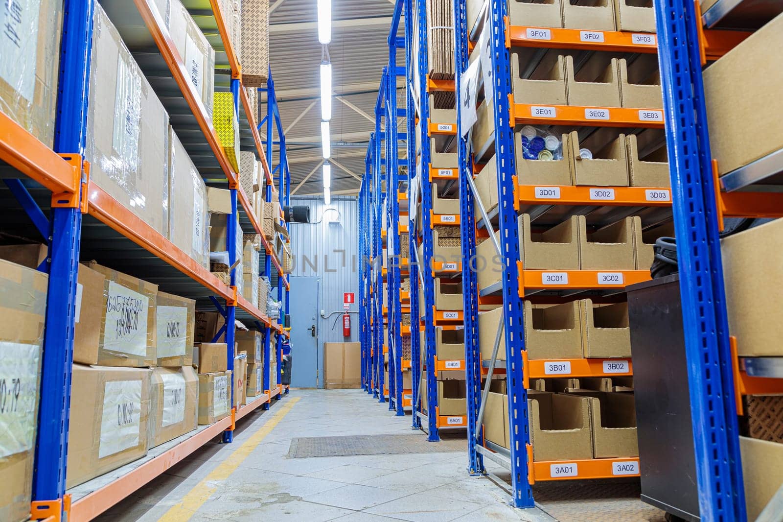 High racks in the warehouse of goods. High quality photo