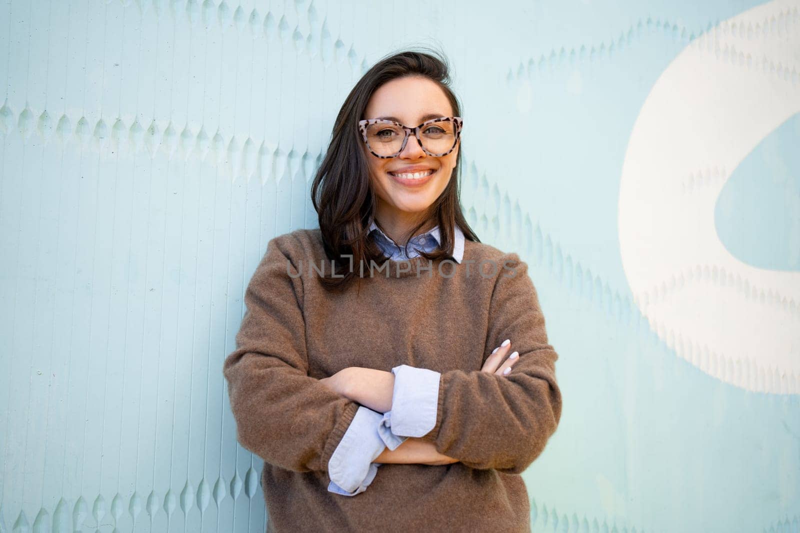 Happy woman in glasses outdoor by andreonegin