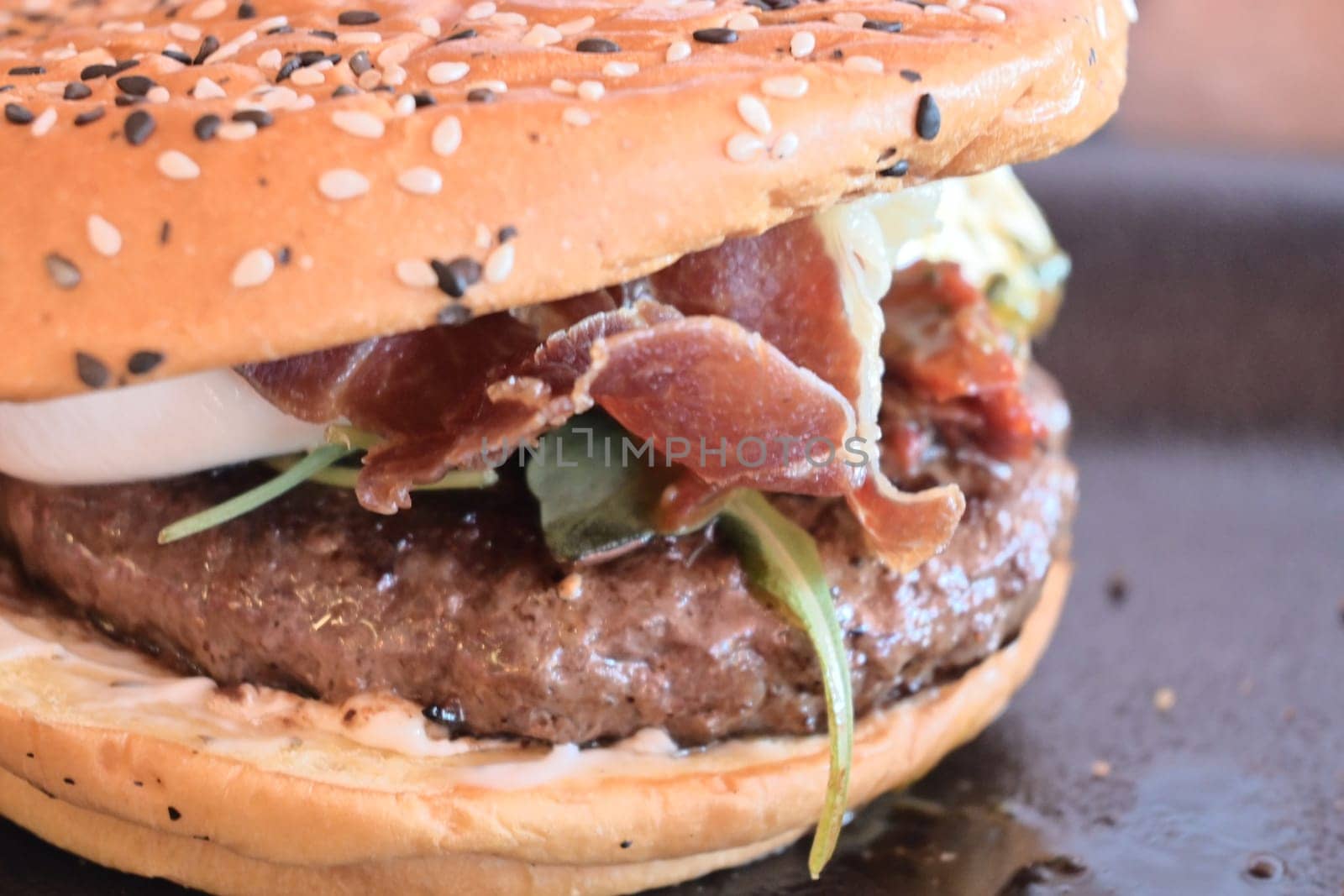 Beef Egg and Bacon Burger Served in Restaurant. American Food. Tasty Gourmet on Wooden Table.