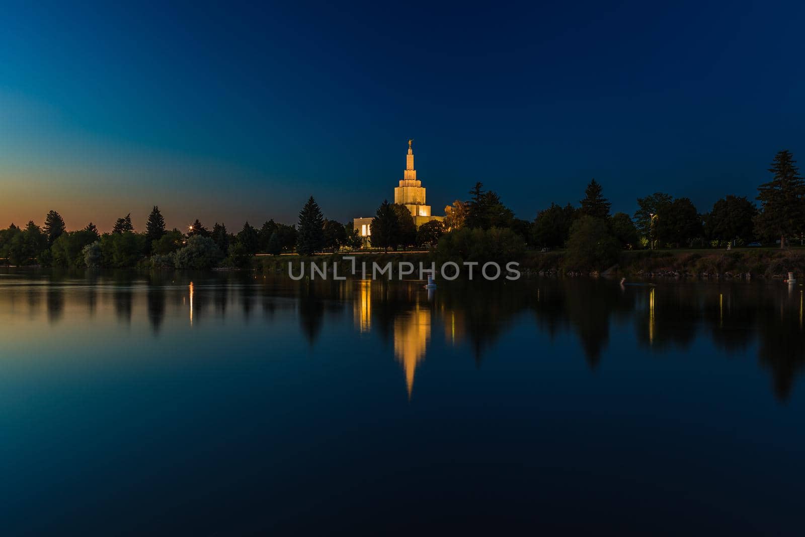 Idaho Falls, Idaho - JUNE 30, 2012: The gleaming Mormon Temple serves as a centerpiece to the city, standing on the banks of the Snake River.