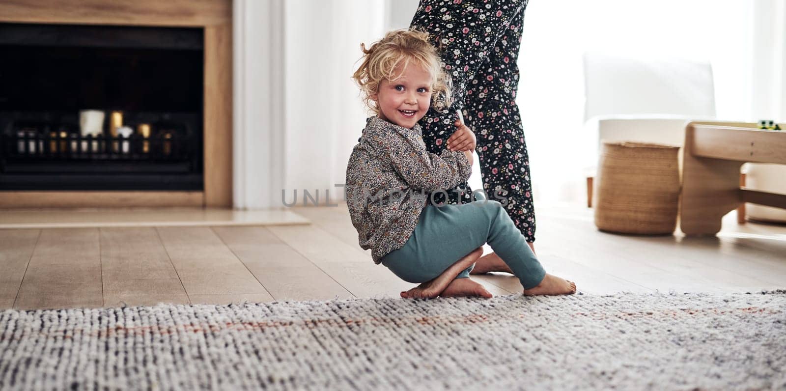 Im never letting you go. an adorable little girl bonding with her mother during a day at home