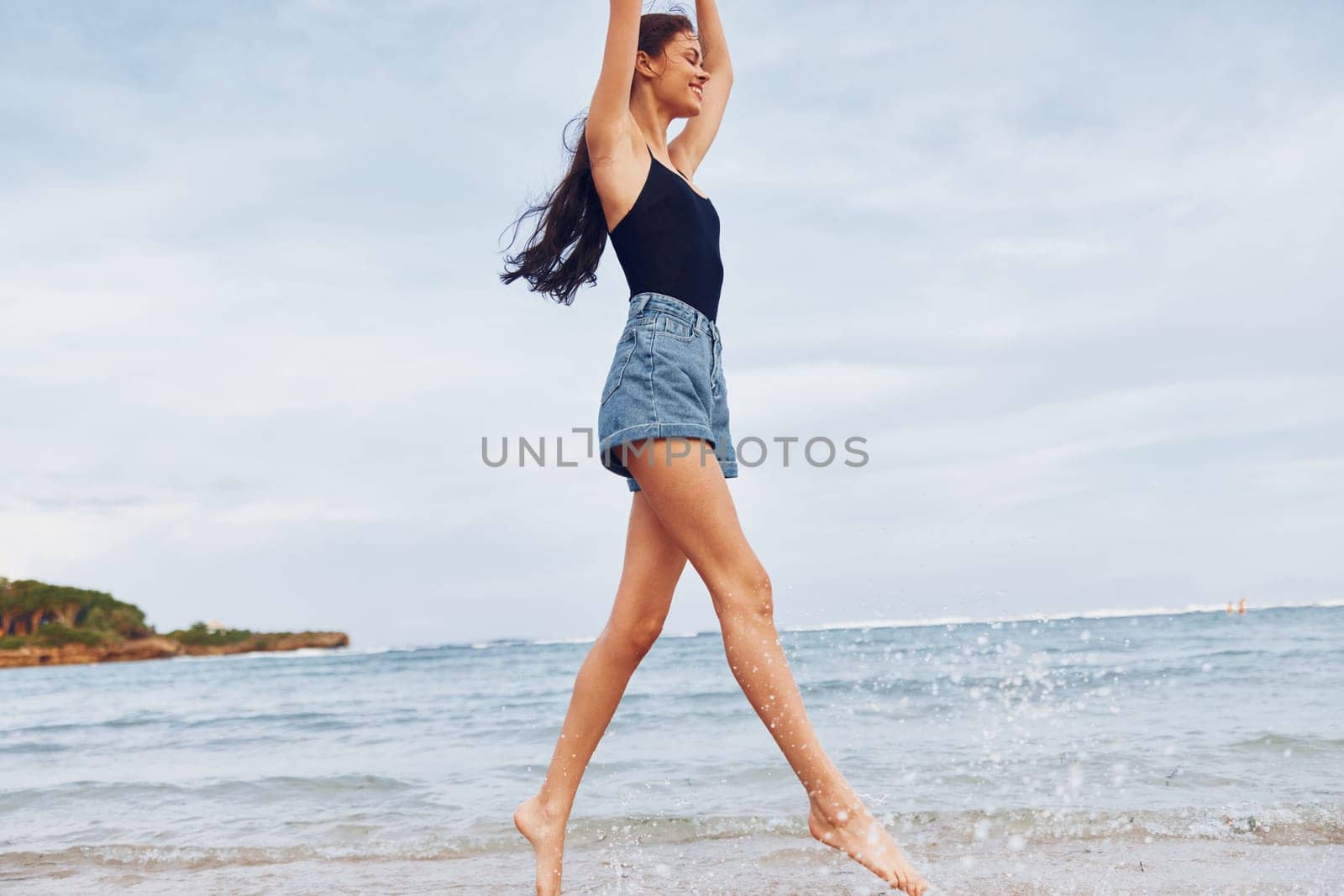 hair woman sunset fun female person running long smile sand summer carefree young sunrise beach lifestyle nature travel sexy freedom relax sea