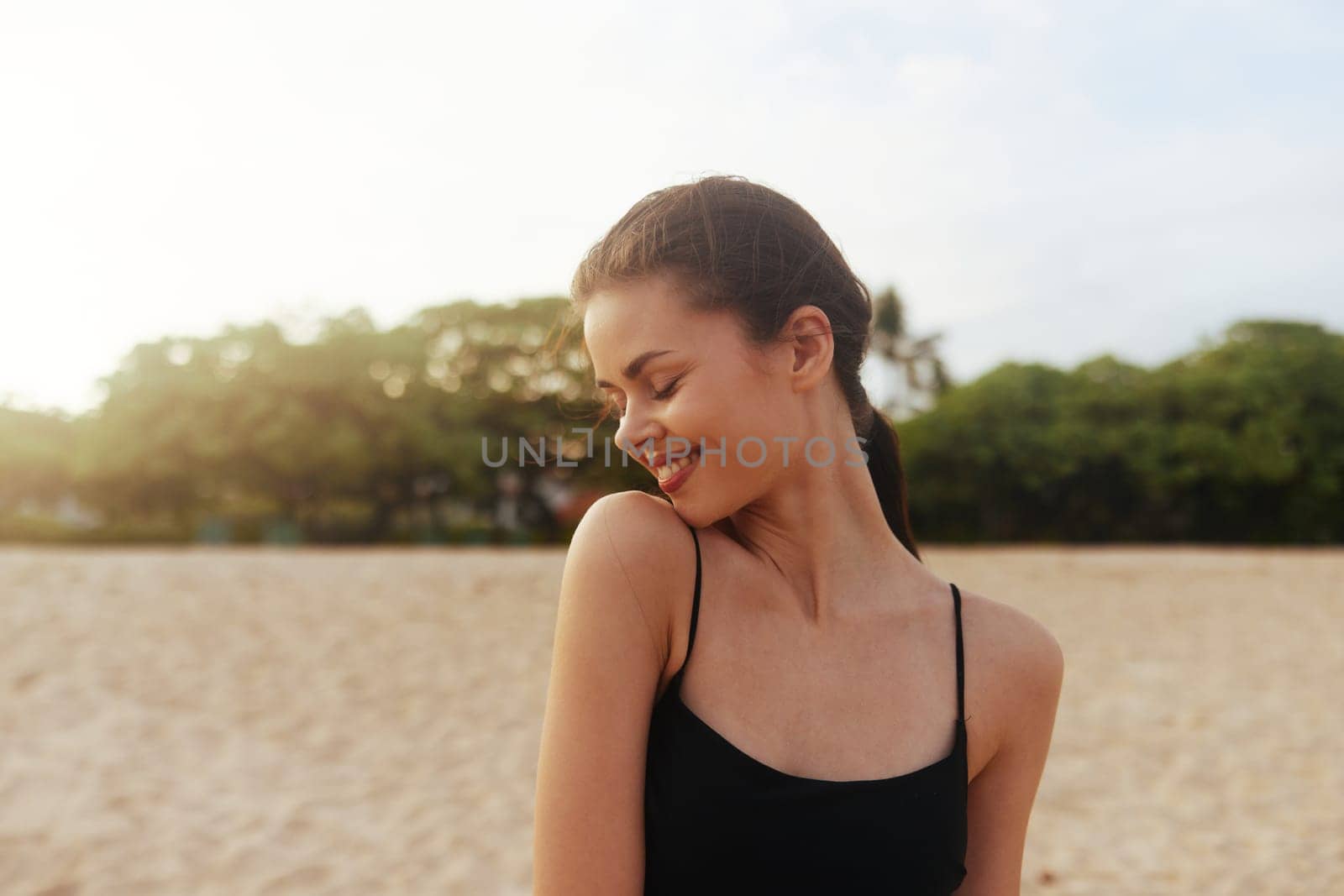 woman smile vacation ocean summer shore beach sunset lifestyle sea sand by SHOTPRIME