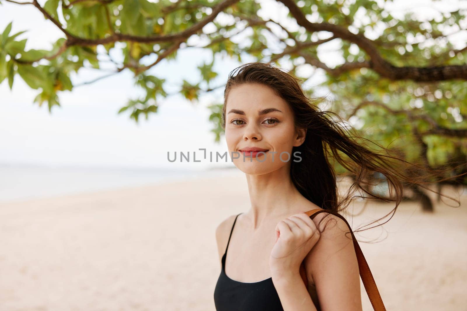 bag woman ocean nature person smile tropical free holiday smiling walking young beach female vacation adult summer dress sand sea sun