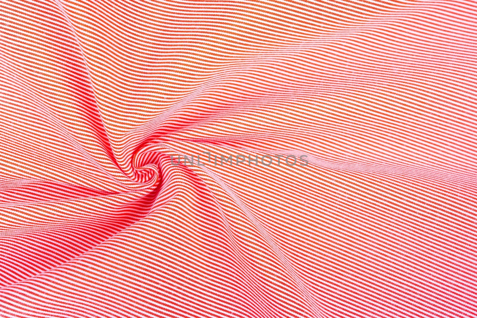 Top view of white and red striped cloth.