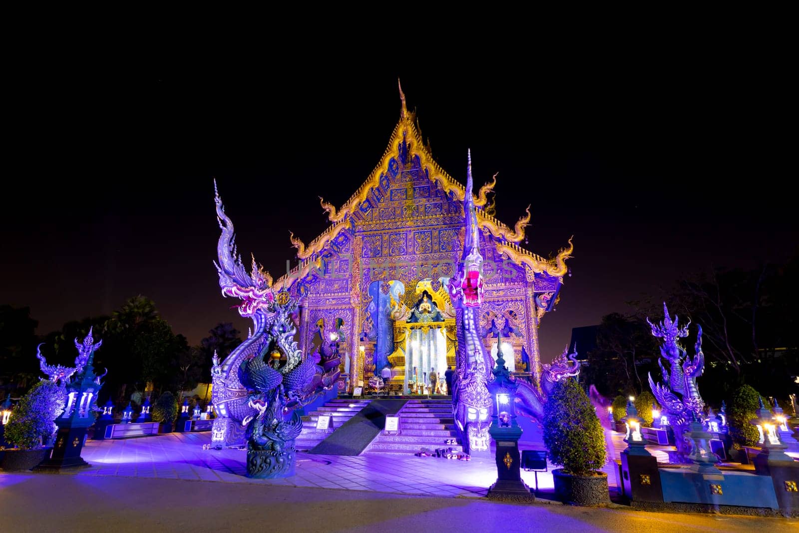 Wat Rong Suea Ten, or Blue Temple in Thai Lanna style in night time at Chiang Rai Province, Northern Thailand