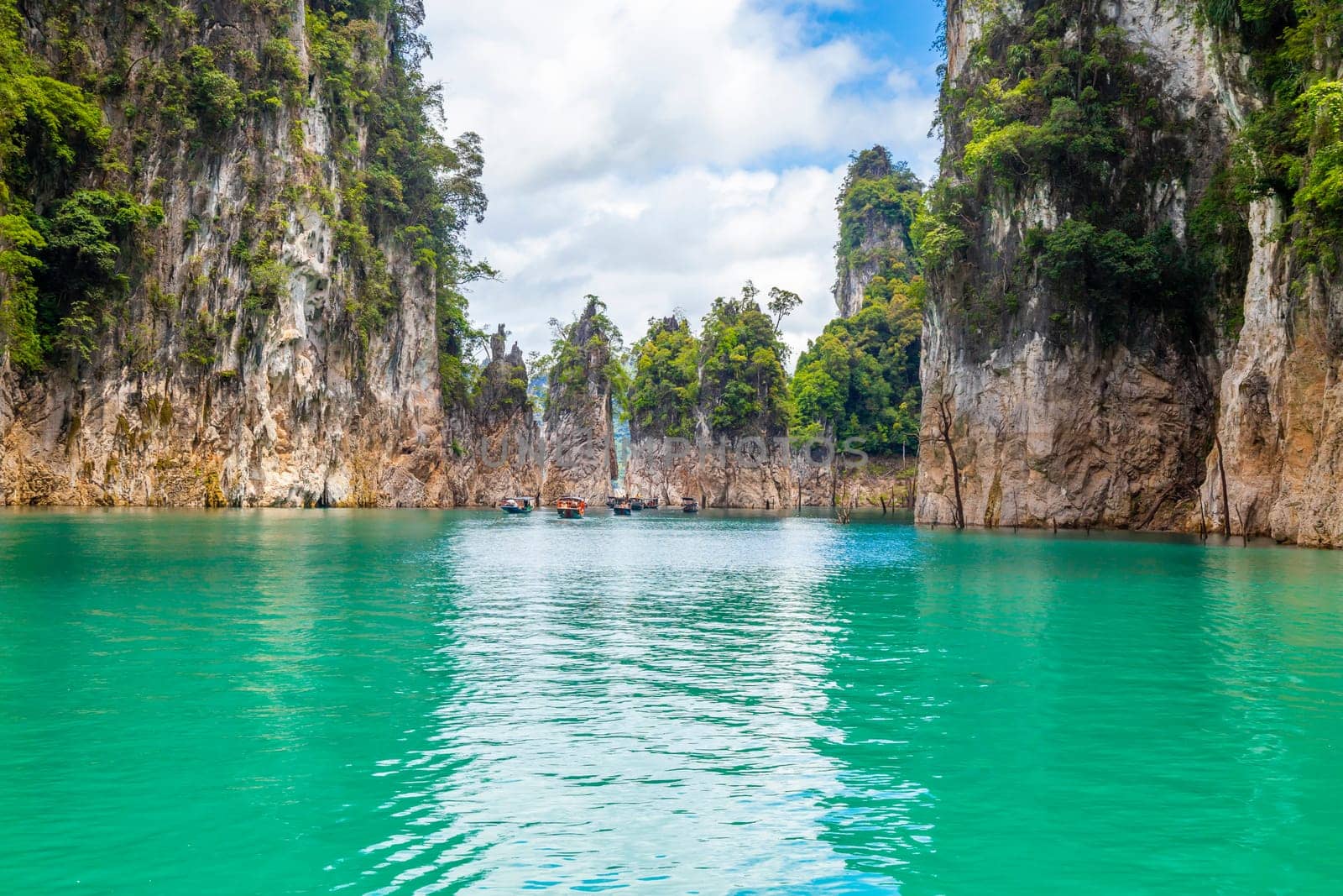 Three rocks in Cheow Lan Lake, Khao Sok National Park, Thailand.