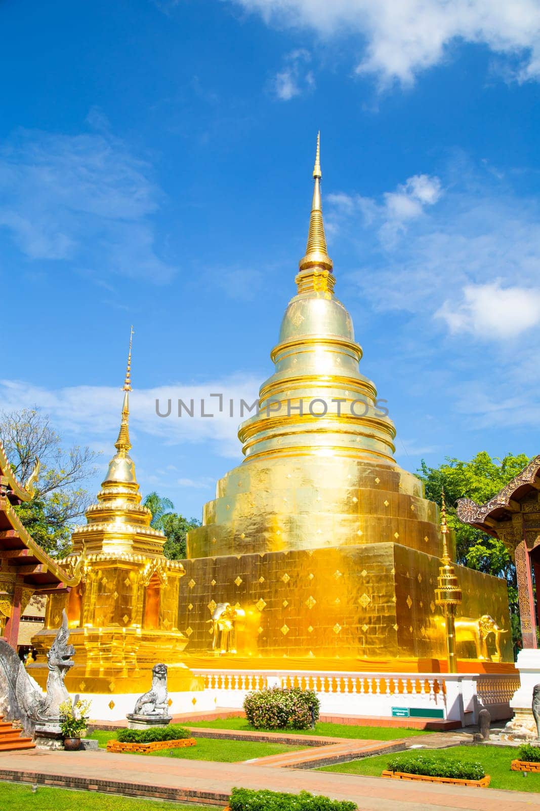 The Wat Phra Sing Temple with blue sky of Chiangmai Thailand by Gamjai