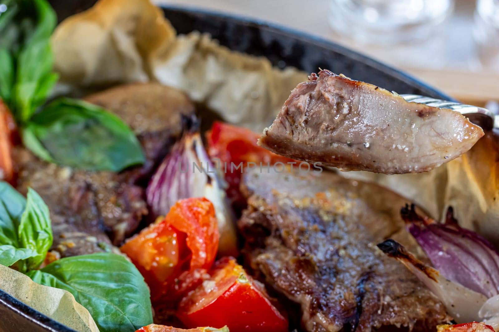 Beef tongue baked in a cast-iron pan with vegetables by Milanchikov