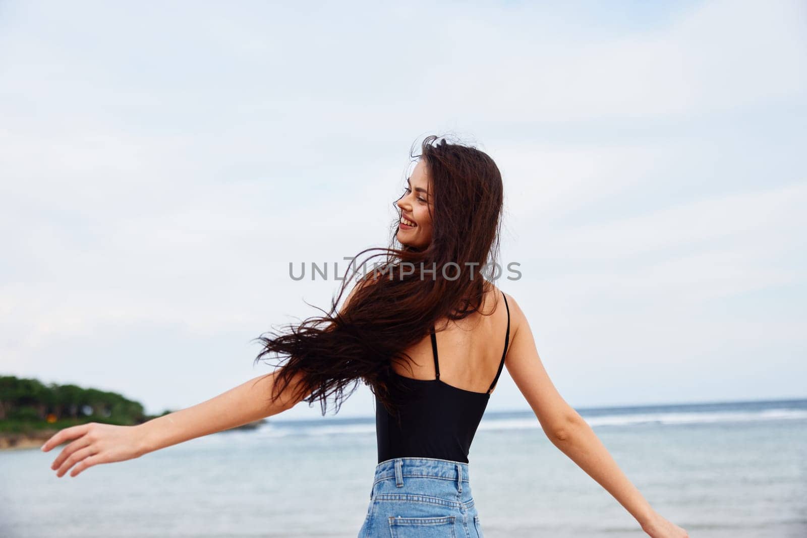 beautiful woman smile body summer sunset sea beauty ocean activity young beach lifestyle travel running positive female freedom sexy happy walking