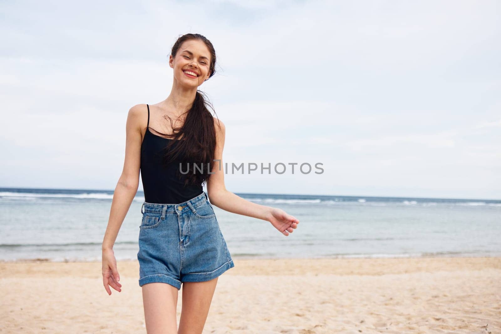 woman running sea lifestyle travel sunset beauty beach summer smile young by SHOTPRIME