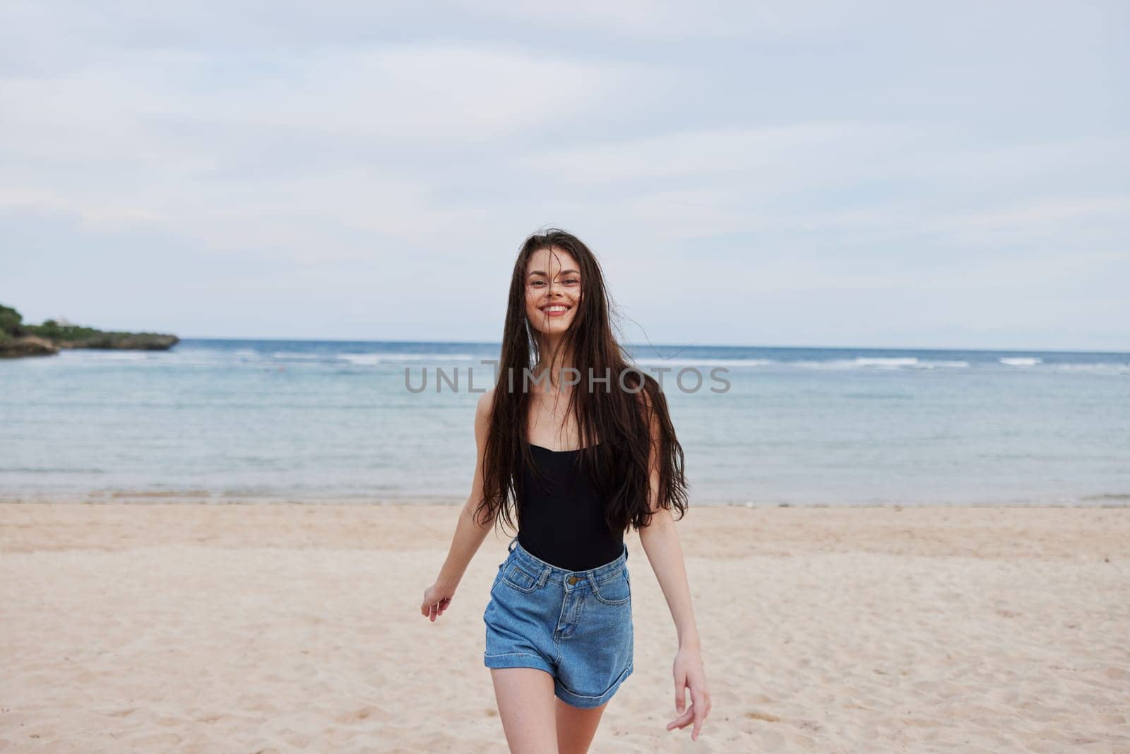 woman young travel beach sunset running lifestyle hair smile summer sea by SHOTPRIME